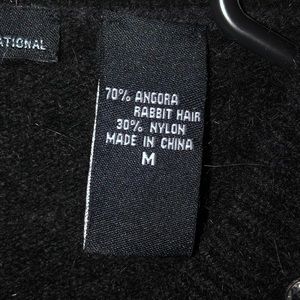 Black Angora rabbit hair cardigan.